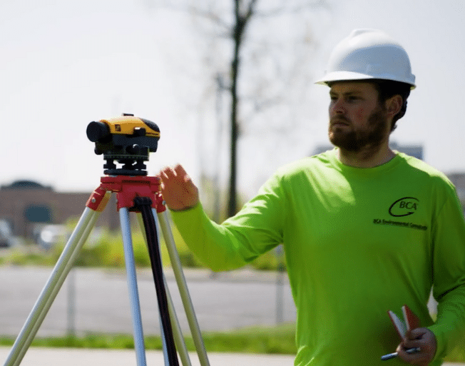 BCA employee conducting a land survey