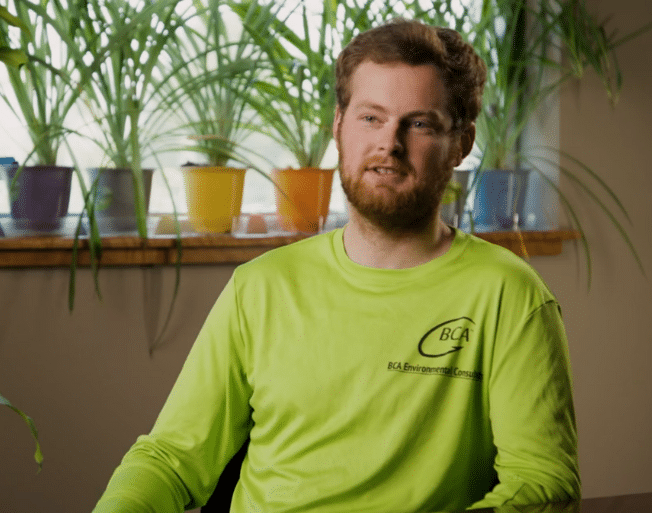 BCA employee in a conversation